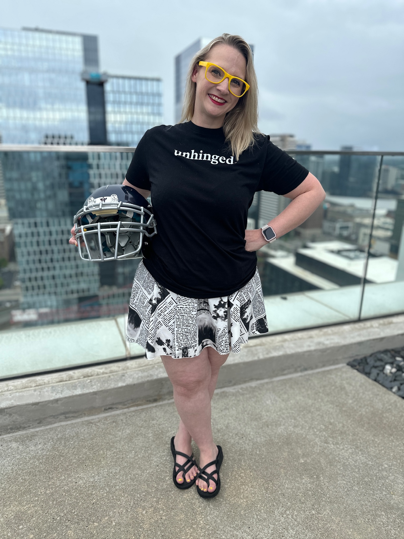 Kabrina Holding Football Helmet